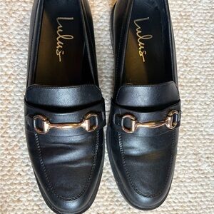 Lulu's Elegant Black Loafers with Gold Accent